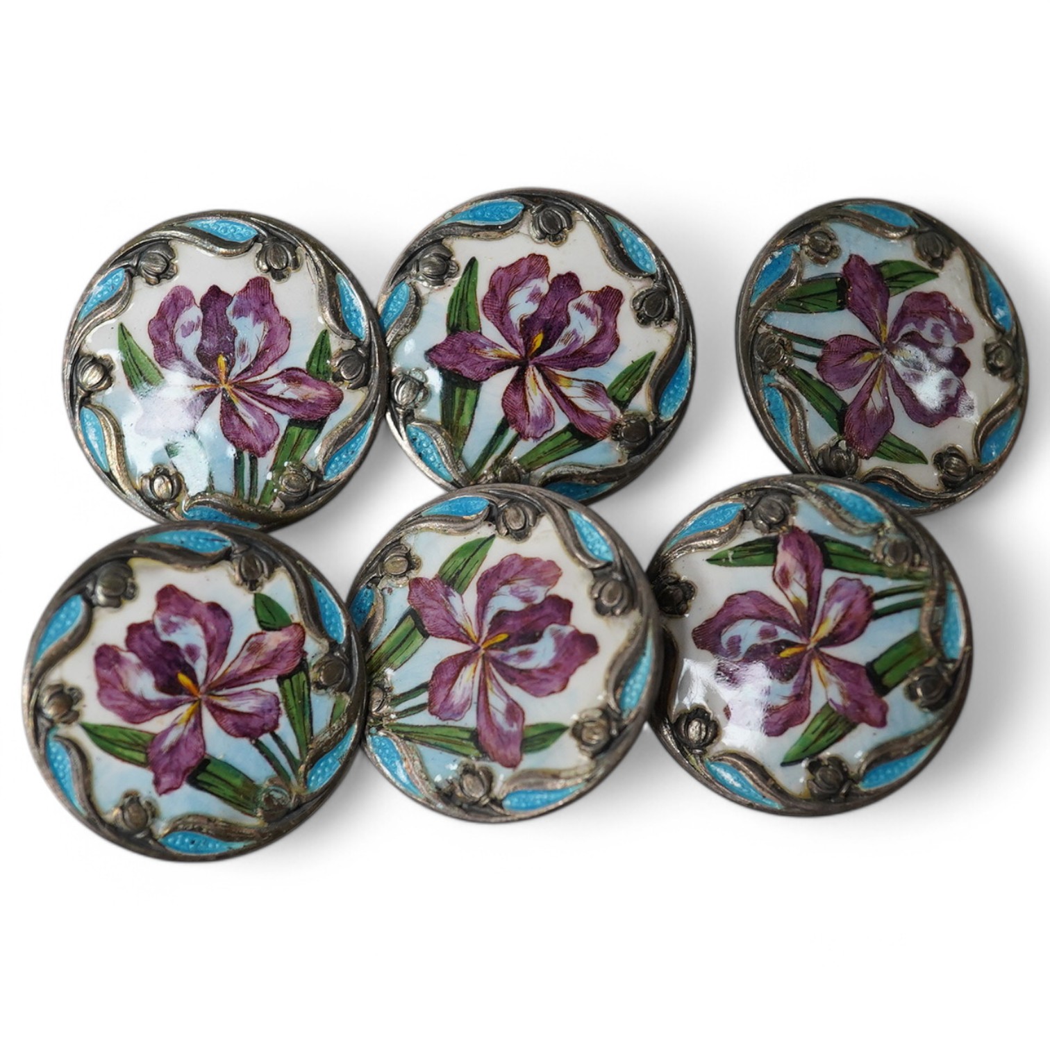 A set of 6 Art Nouveau white metal buttons enamelled with irises, stamped Sterling, 24mm. Condition - good